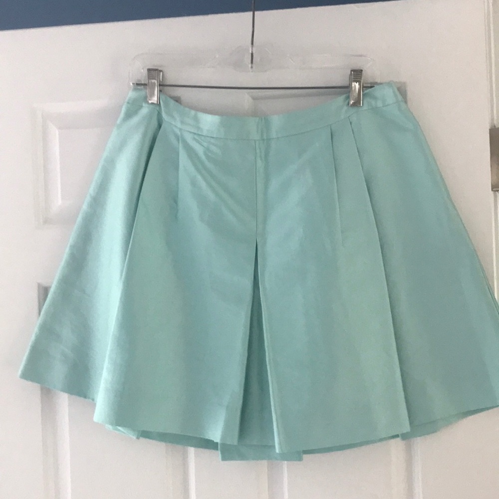 Silk pleated skirt.
